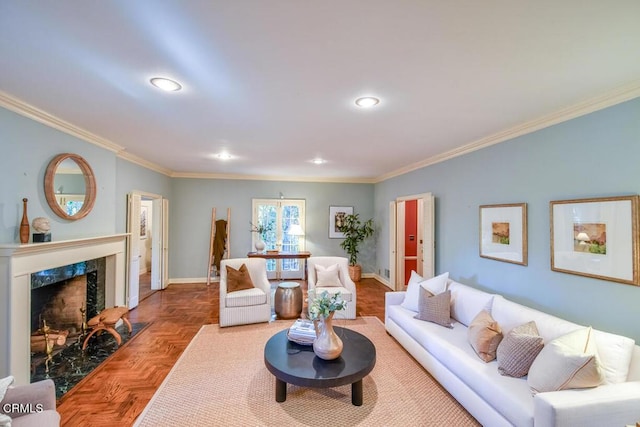 living room with parquet floors, crown molding, and a premium fireplace