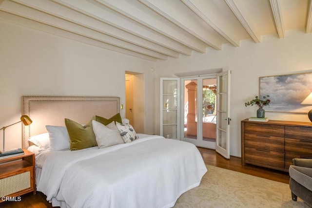 bedroom featuring beamed ceiling, hardwood / wood-style floors, access to exterior, and french doors