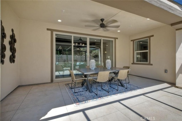 view of patio featuring ceiling fan