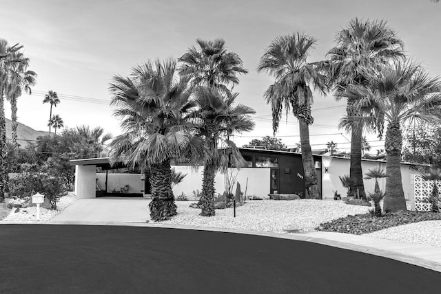 view of front of home with a carport