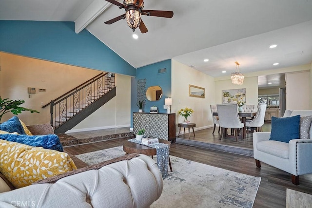 living room with ceiling fan with notable chandelier, dark hardwood / wood-style flooring, and lofted ceiling with beams