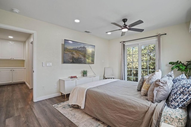 bedroom with ceiling fan, access to exterior, and dark hardwood / wood-style floors