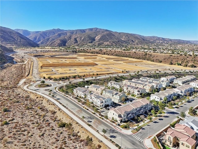 drone / aerial view featuring a mountain view