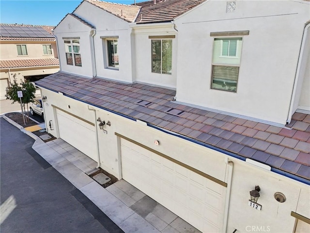 view of patio / terrace with a garage