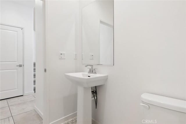 bathroom with sink and toilet