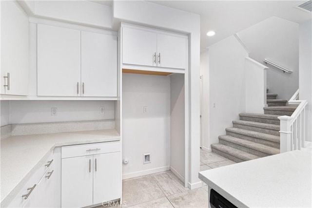 kitchen with white cabinetry