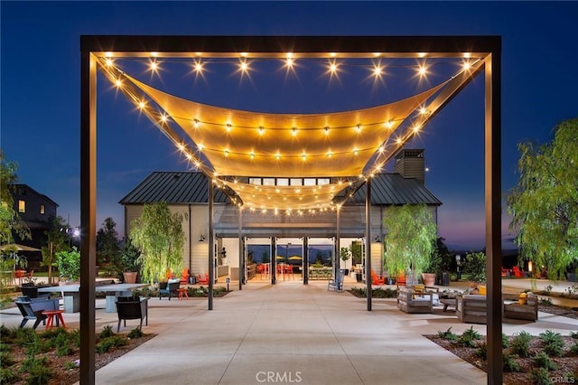 view of home's community with a patio area