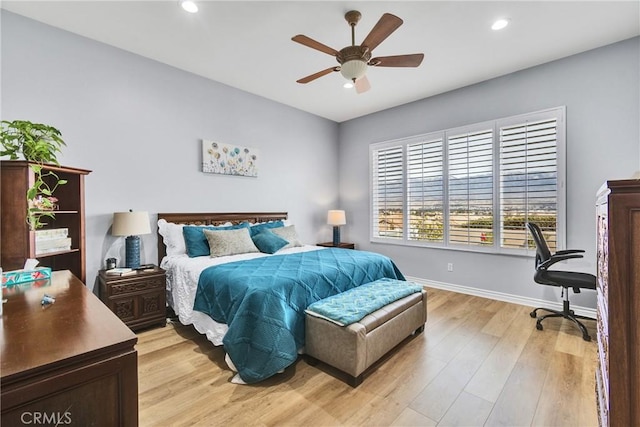 bedroom featuring ceiling fan and light wood-type flooring