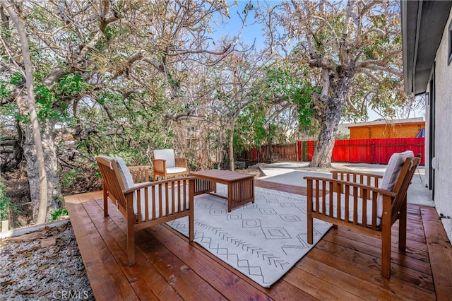 wooden terrace featuring a patio