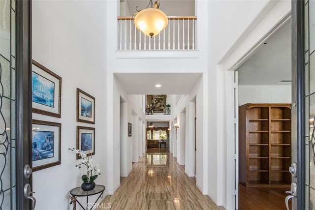 foyer with a towering ceiling