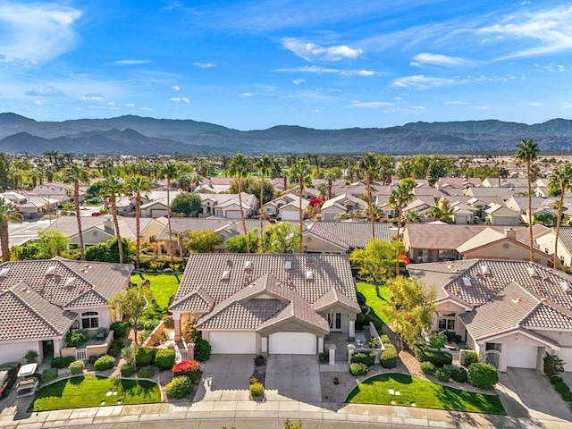 drone / aerial view featuring a mountain view