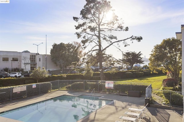 view of swimming pool featuring a patio