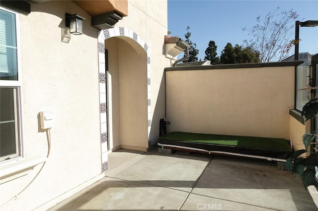 exterior space featuring a gate