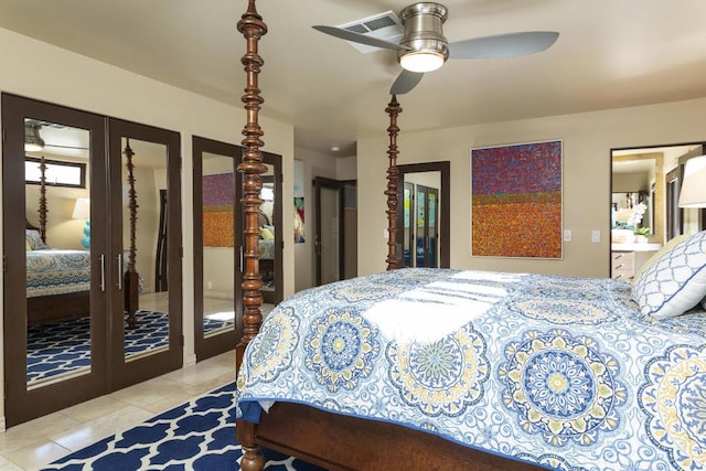 bedroom featuring ceiling fan, connected bathroom, and light tile patterned flooring