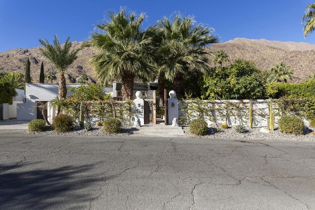 view of front of home featuring a mountain view