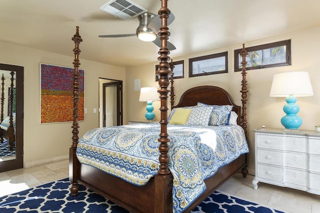 bedroom with ceiling fan and light tile patterned floors