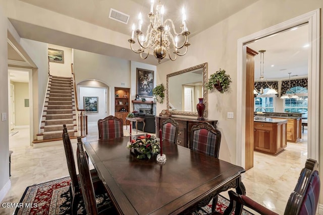 dining space featuring an inviting chandelier