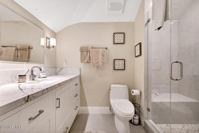 bathroom featuring vaulted ceiling, toilet, an enclosed shower, and vanity