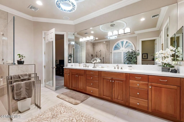 bathroom featuring a shower, crown molding, tile patterned floors, and vanity