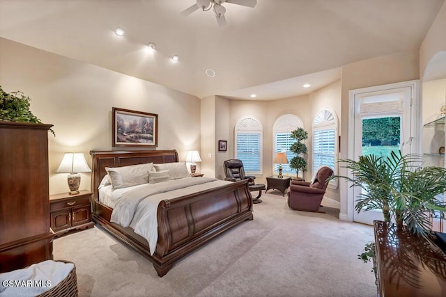 bedroom featuring ceiling fan and light carpet