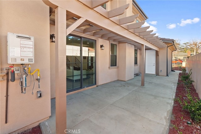 view of patio with water heater