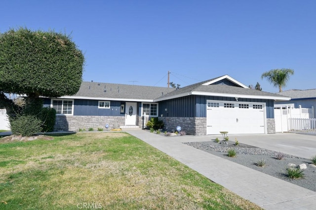 ranch-style house with a front lawn and a garage