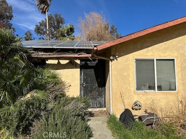 view of home's exterior featuring solar panels