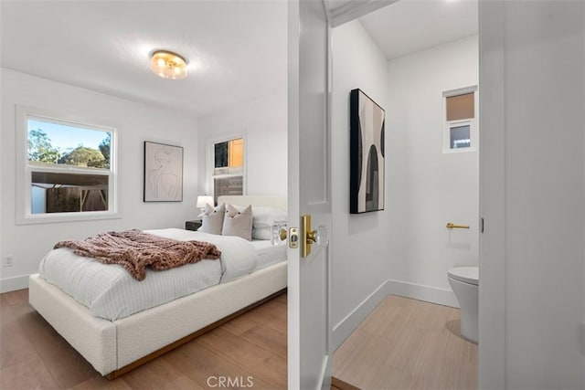 bedroom featuring hardwood / wood-style floors