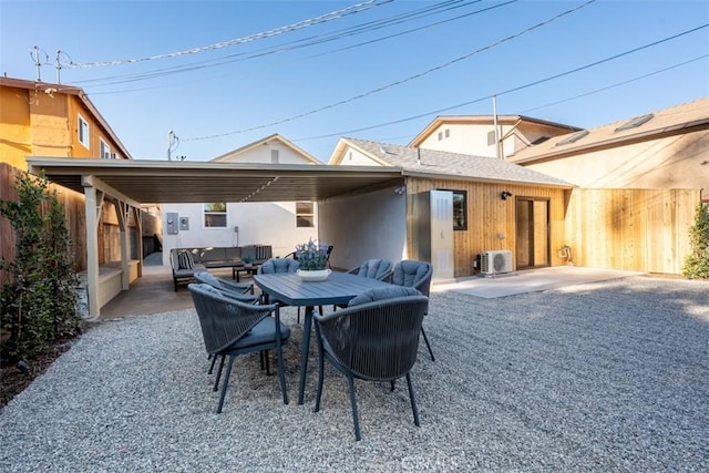 rear view of property with a patio area