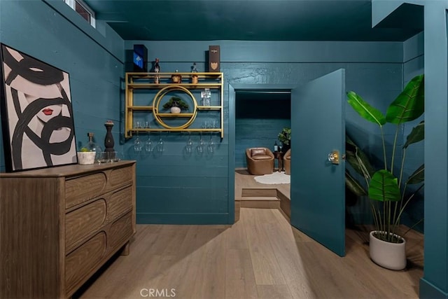 bathroom featuring vanity and hardwood / wood-style flooring