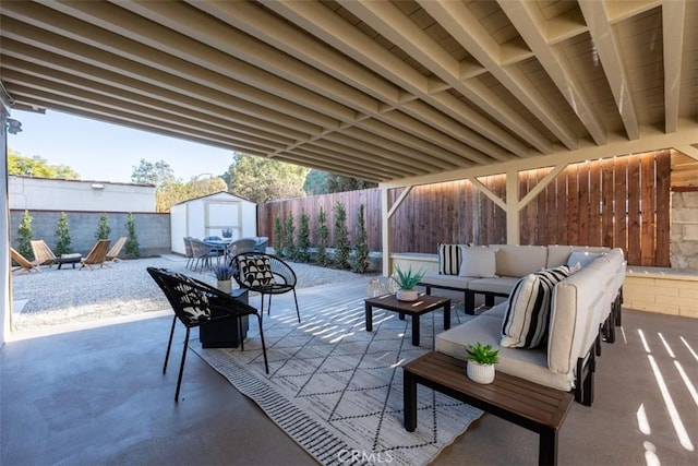 view of patio / terrace with a storage unit and an outdoor hangout area