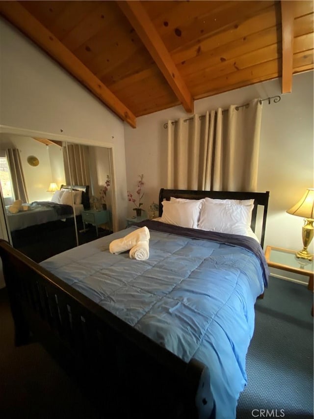 carpeted bedroom with wood ceiling and vaulted ceiling with beams