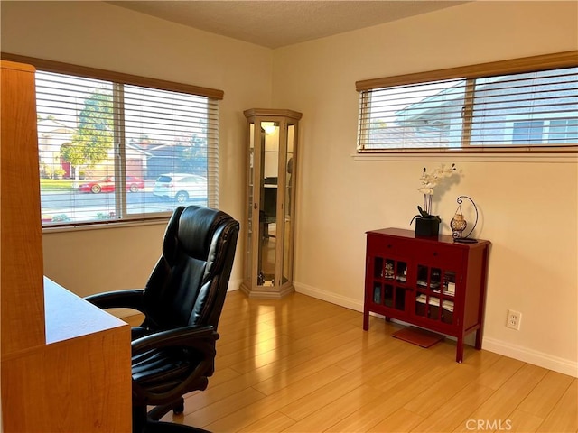 office space featuring light wood-type flooring