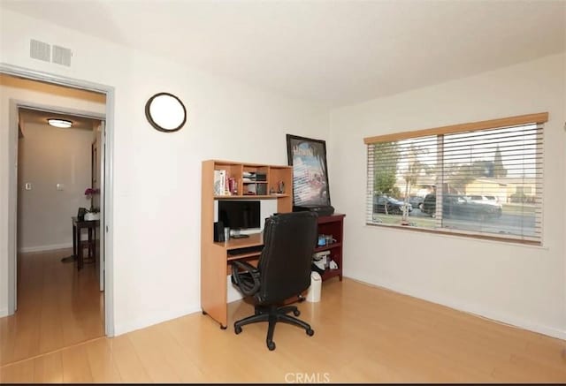 office space featuring wood-type flooring