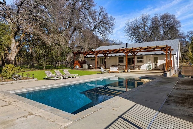 view of swimming pool featuring a patio area, a lawn, and a pergola