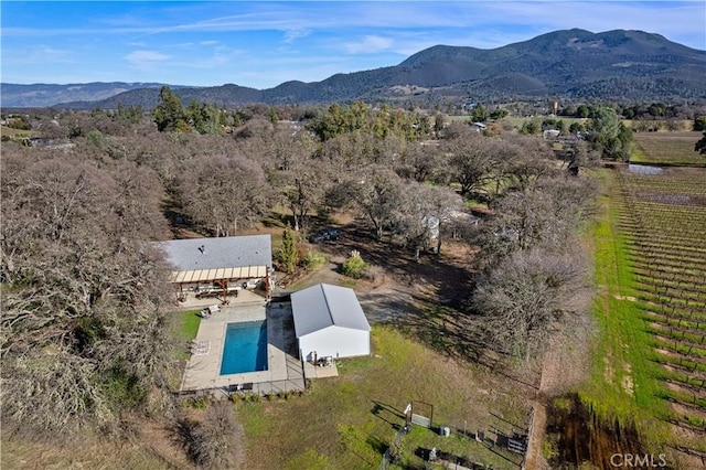 aerial view featuring a rural view and a mountain view