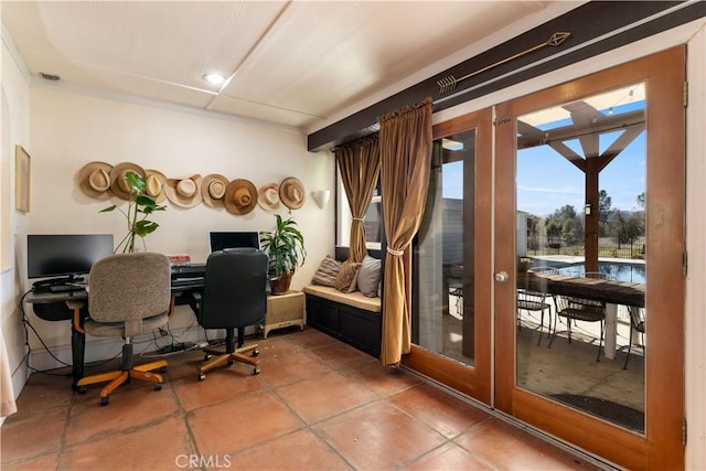 tiled office featuring french doors