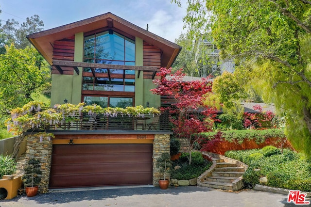 modern home featuring a garage