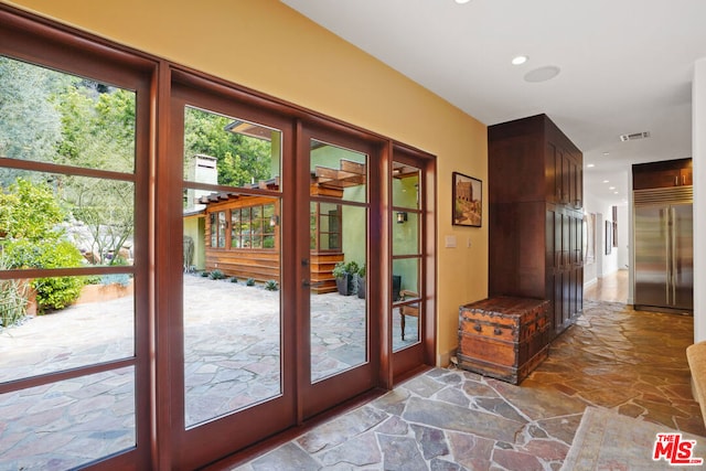 doorway to outside featuring french doors