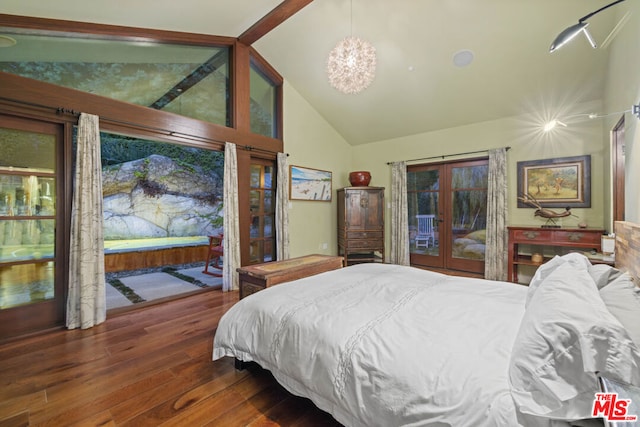 bedroom with french doors, dark wood-type flooring, a chandelier, high vaulted ceiling, and access to outside