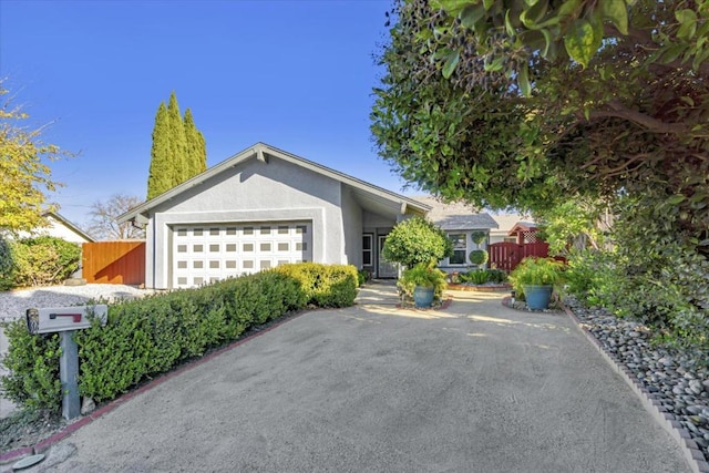 single story home with a garage