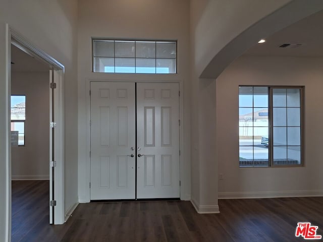 foyer featuring dark hardwood / wood-style floors