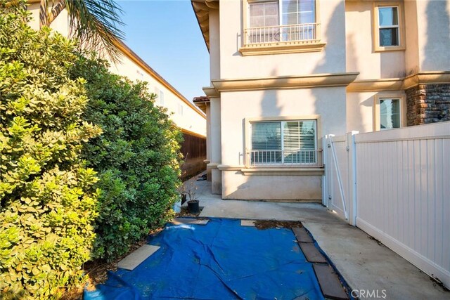 rear view of property with a patio