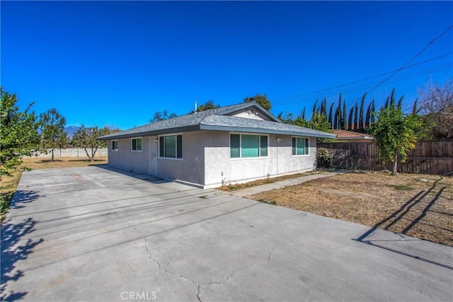 rear view of house with a patio area