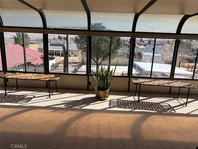 unfurnished sunroom with a healthy amount of sunlight