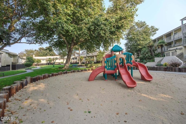 view of jungle gym featuring a yard