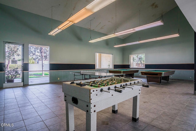 recreation room with a wealth of natural light, pool table, and high vaulted ceiling