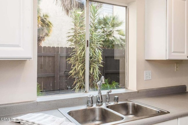 784 Seawind Way, Port Hueneme, CA 93041 - kitchen view of a sink and white cabinets