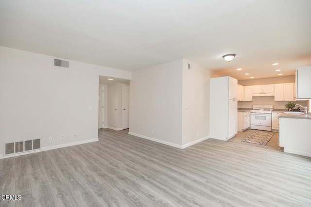 784 Seawind Way, Port Hueneme, CA 93041 - unfurnished living room with light wood-type flooring and recessed lighting