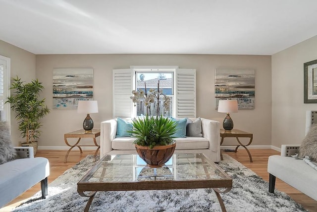 sitting room with light hardwood / wood-style floors